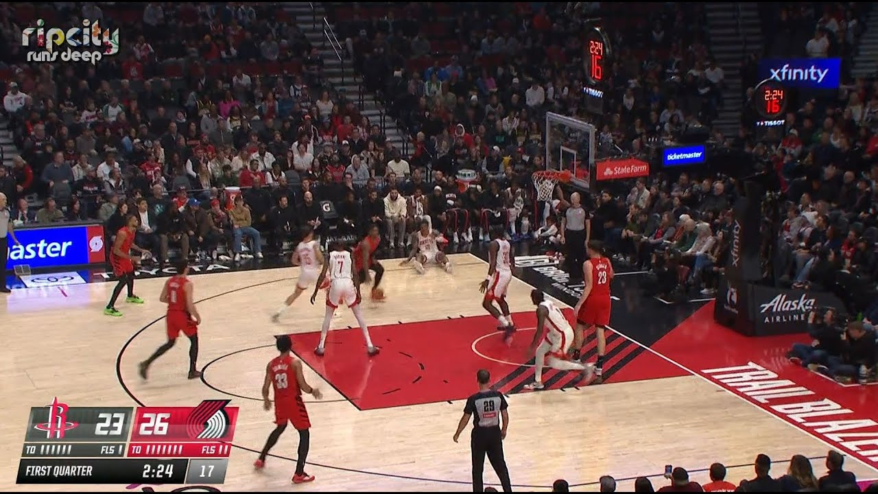 Caleb Love sends Smith Jr. to the floor with the pump fake, drives, pump fakes again and scores