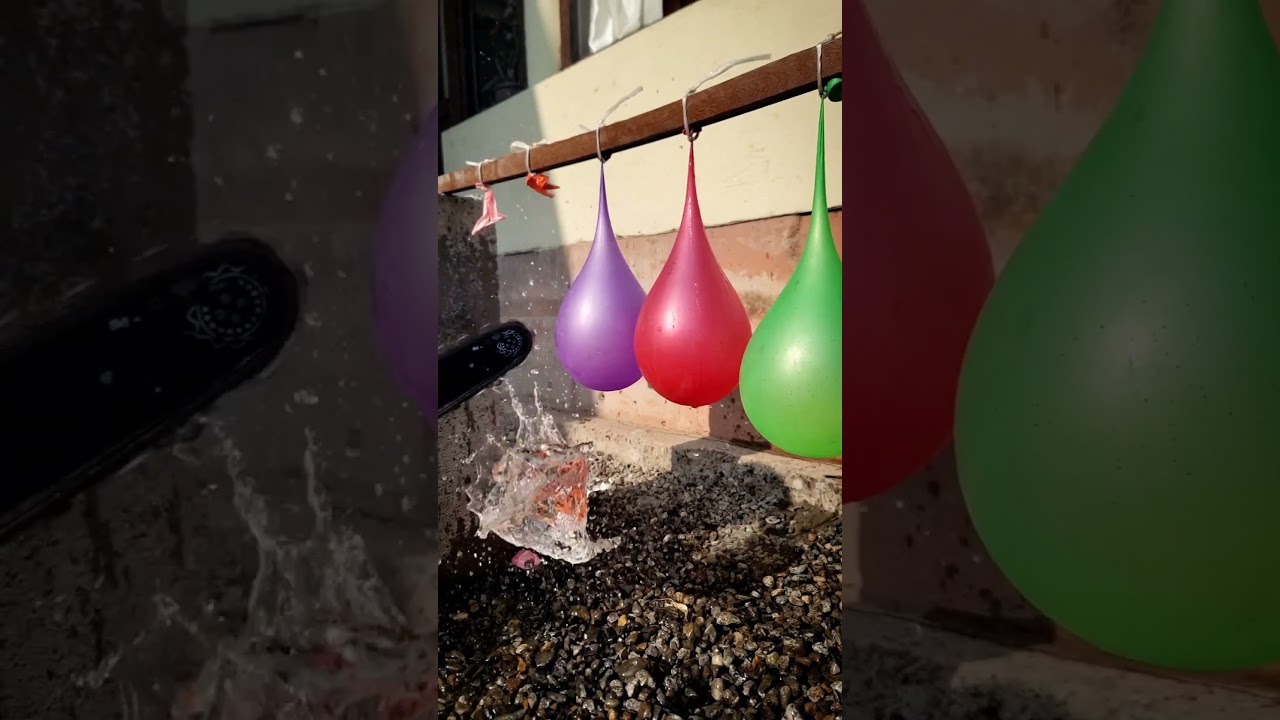 “5 Water Balloons vs Electric Saw | Colorful Slow Motion Burst” 