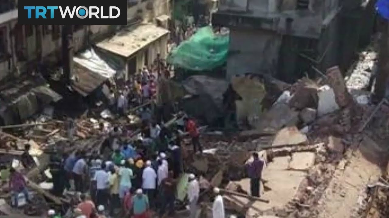 At least two dead, dozens trapped in Mumbai building collapse