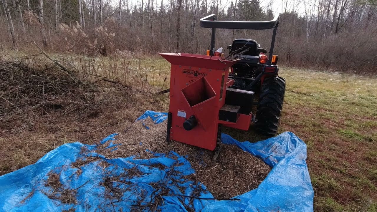 Working on the pile. Bear Cat Chipper / Shredder model 554