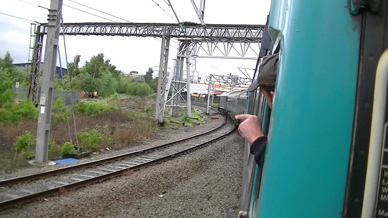Passing Crewe Electric Depot on 67003