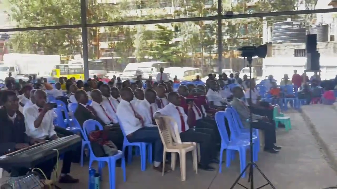 Mathare North Church Choir receiving new uniform from a friend of Mc Dieres// Mpendane Msifarakane.