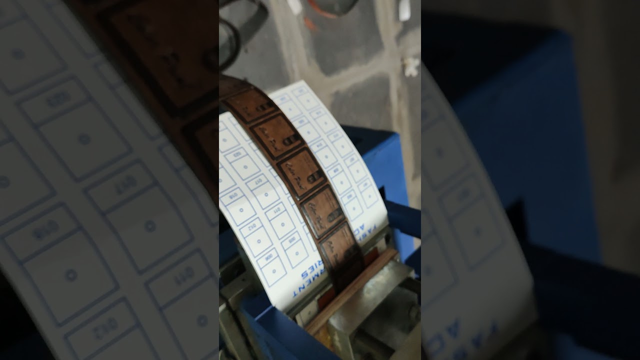 jeans label embossing with cutting