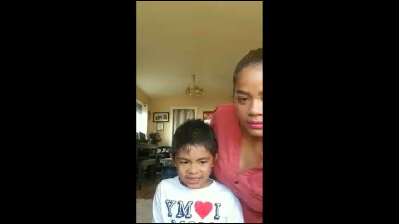 Pulling out Nico 5th loose tooth. How to pull out a loose tooth with a string.