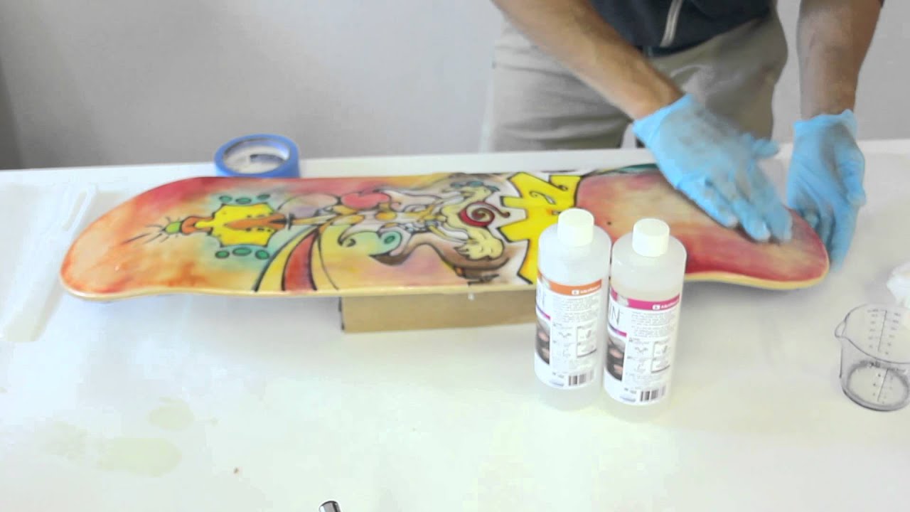 protect the bottom of your skateboard deck art with epoxy resin