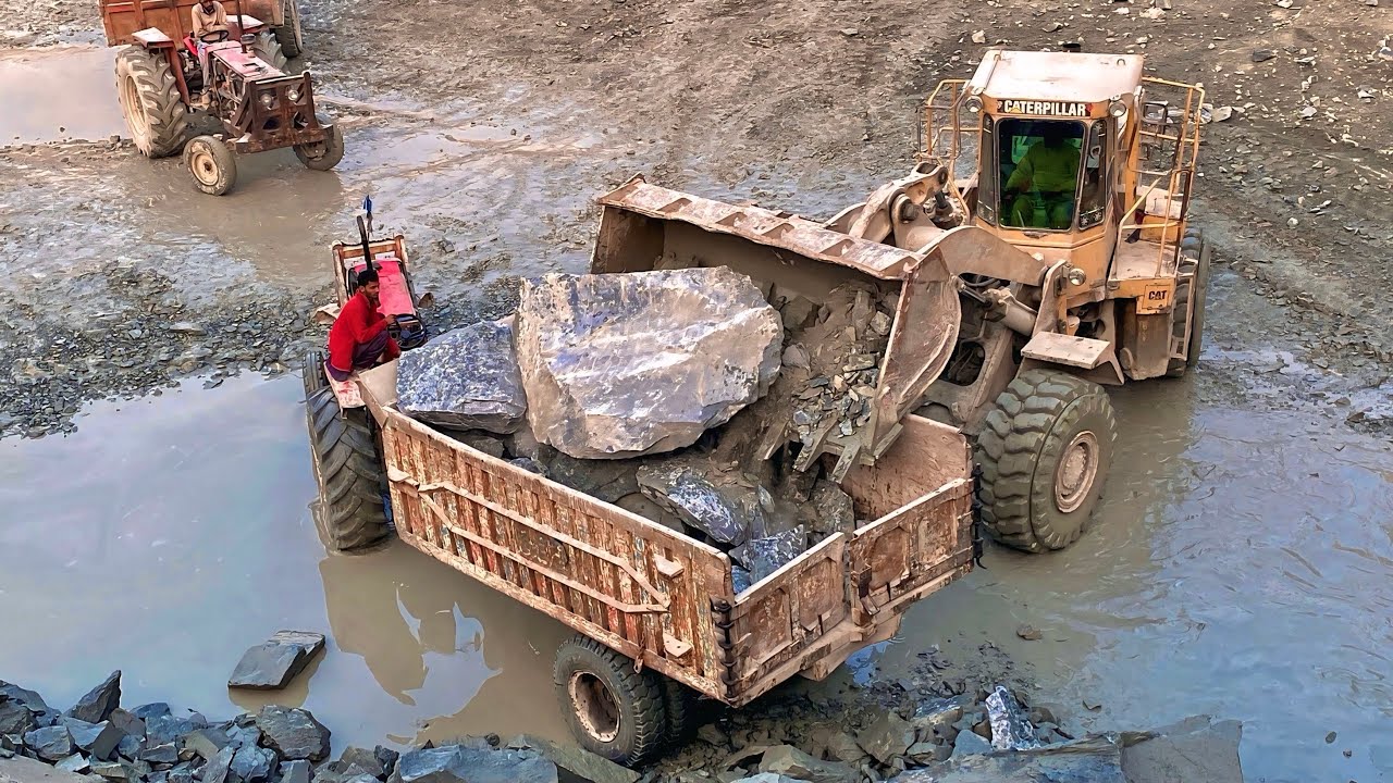 Massive Rock Loading Show By Powerful 966 Wheel Loader 
