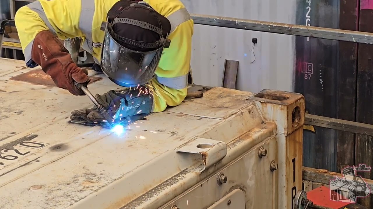Top rail section and welded side patch. Refrigerated shipping container repair