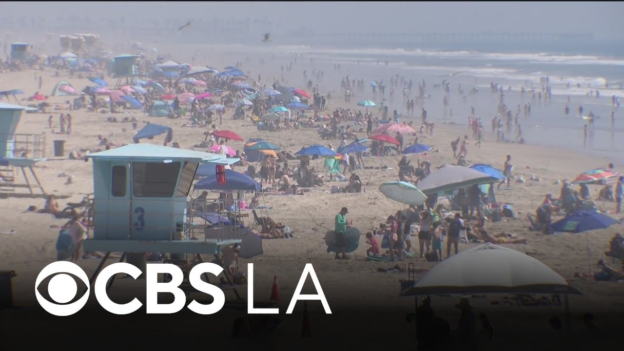 Orange County beaches swarmed by people looking to escape the heat