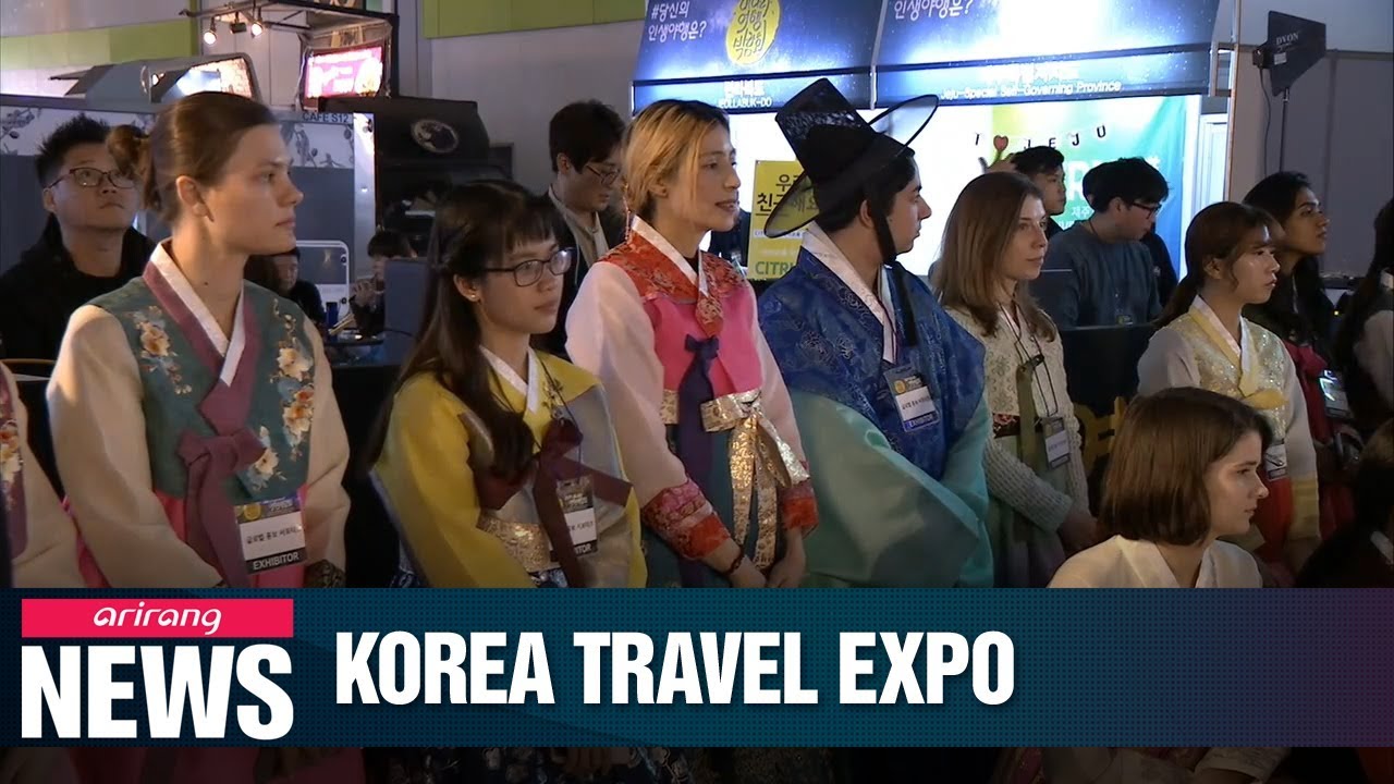 Foreign students promoting tours to S. Korea in Seoul travel exhibition