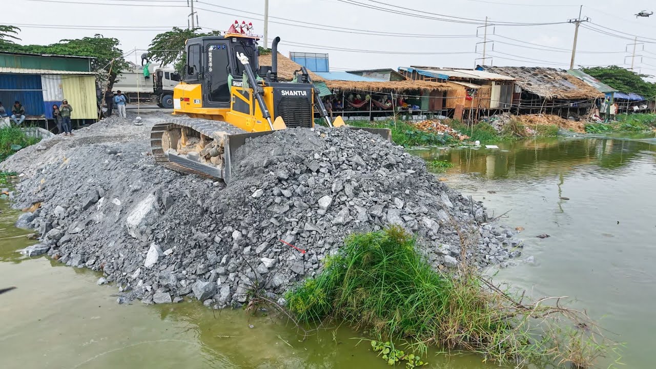 Showing process!!build road cross water using stone by SHANTUI C3 pro Dozer with 25T DONGFENG TRUCKS