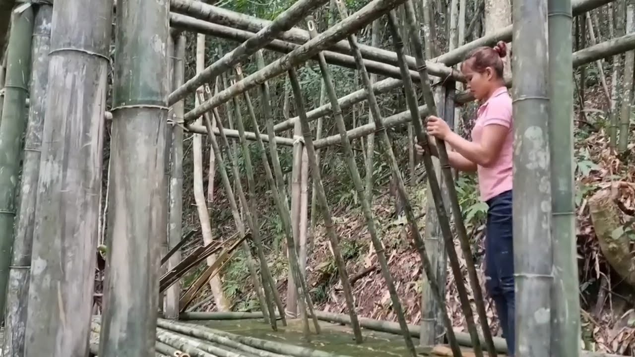 The girl designed the frame and went to gather grass leaves to build the roof- and wove a bamboo bed