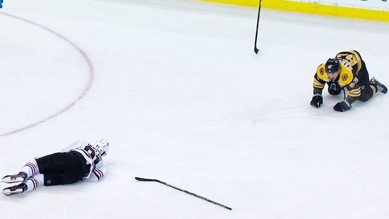 Duclair helped off ice after collision with Marchand