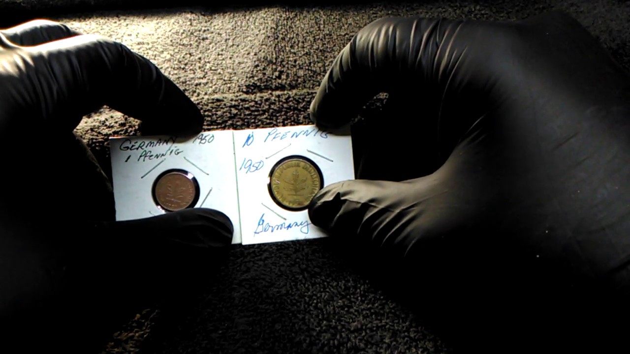 Two 1950 pfennig coins from Germany.