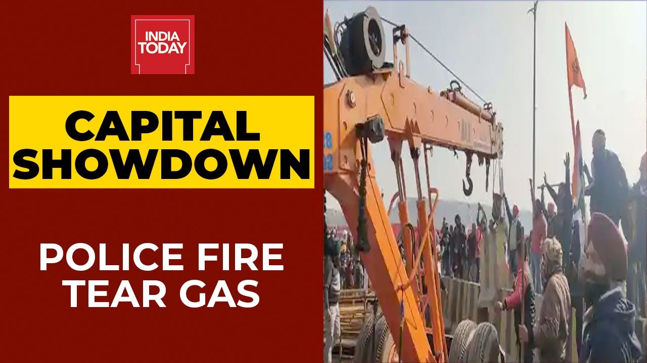 Protesting Farmers Marching From Singhu Border Breach Barricades, Police Fire Tear Gas