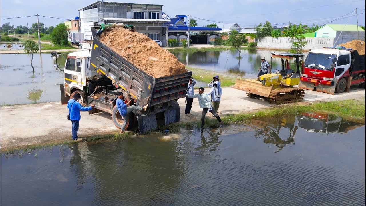 Massive Landfill Operation: DUMP TRUCK NEARLY FLIPS! Extreme Soil Dumping Near Water