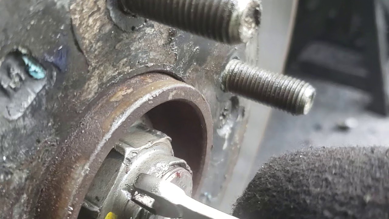 Kia Sedona 2016 how to replace wheel hub and cv axle PART 1