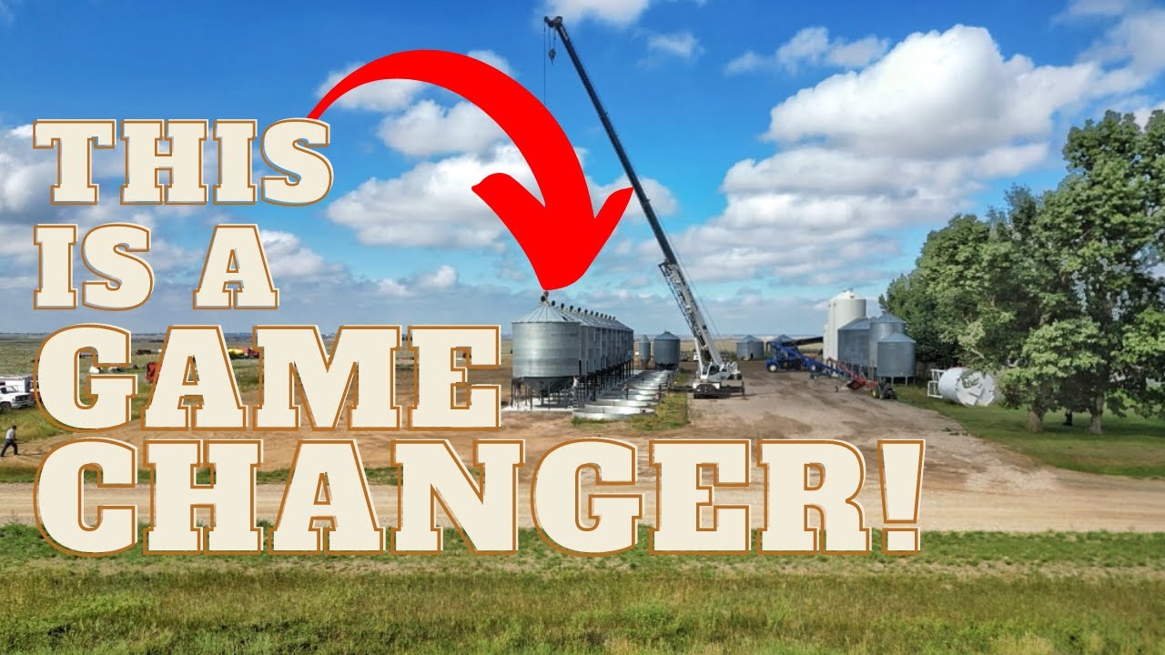 Moving 12 Grain Bins onto Hoppers Just in Time for Harvest