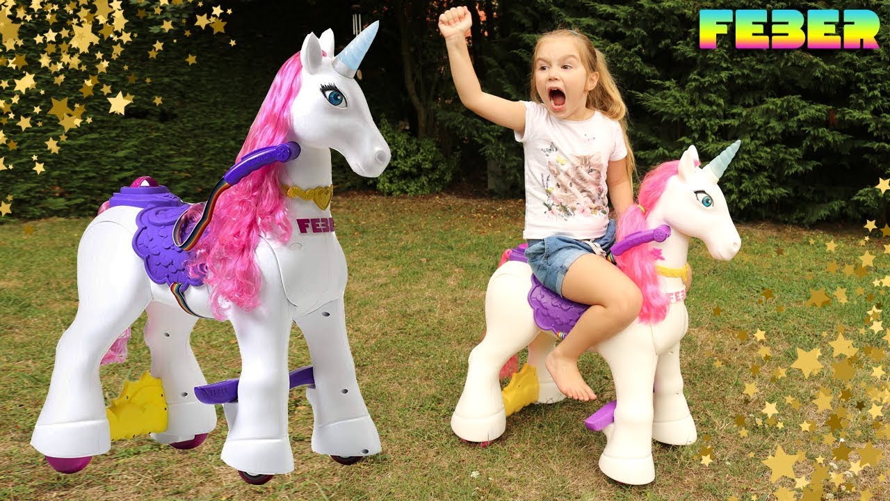 Ellie chevauche une licorne &eacute;lectrique ! Poney pour enfant - Electric Unicorn ! FEBER FAMOSA