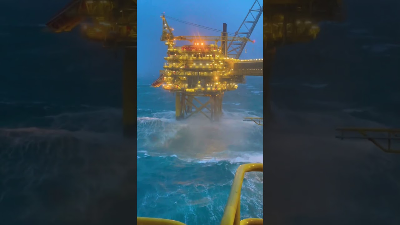Big waves hit oil rig in North Sea.