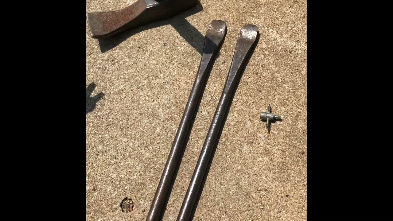 Old School Tire Removal With A Duckbill Hammer & Spoons