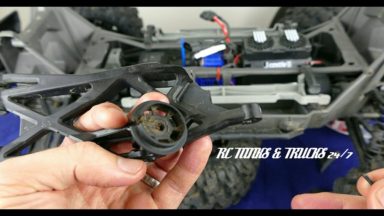 TRAXXAS X-MAXX - How To Replace Lower Front Suspension Arm & Shock Shaft