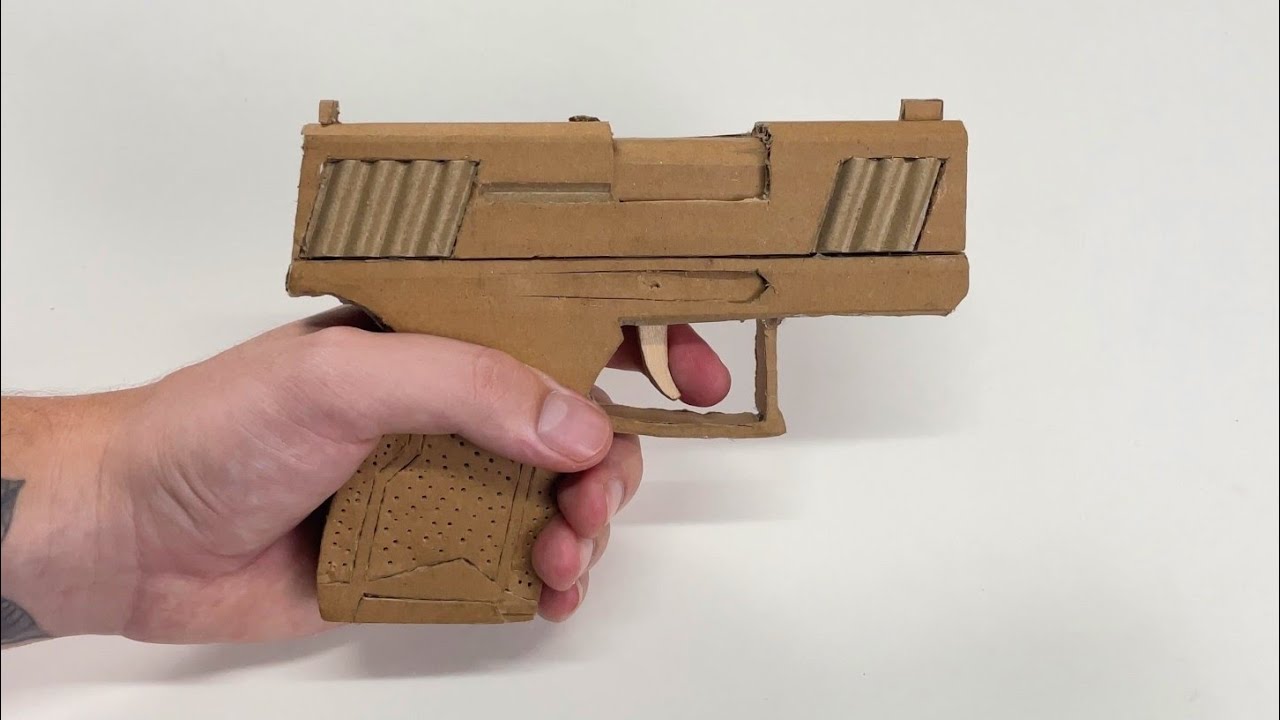 COMO FAZER UMA PISTOLA TAURUS DE PAPELÃO QUE DISPARA