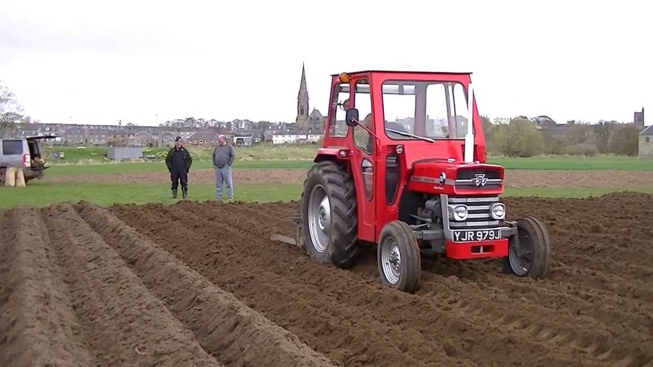 M F 148 & Cramer potato planter