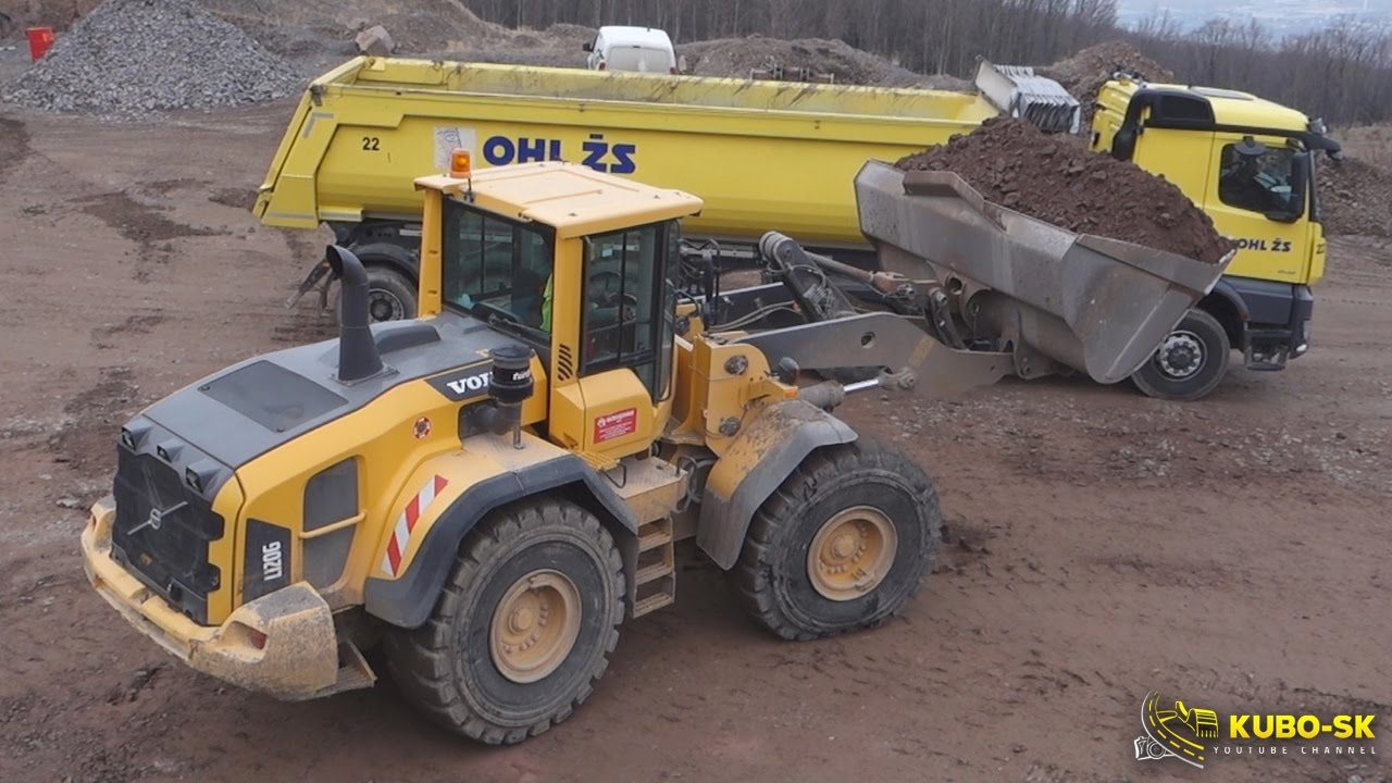 VOLVO L120G wheel loader loading Mercedes Arocs semitruck
