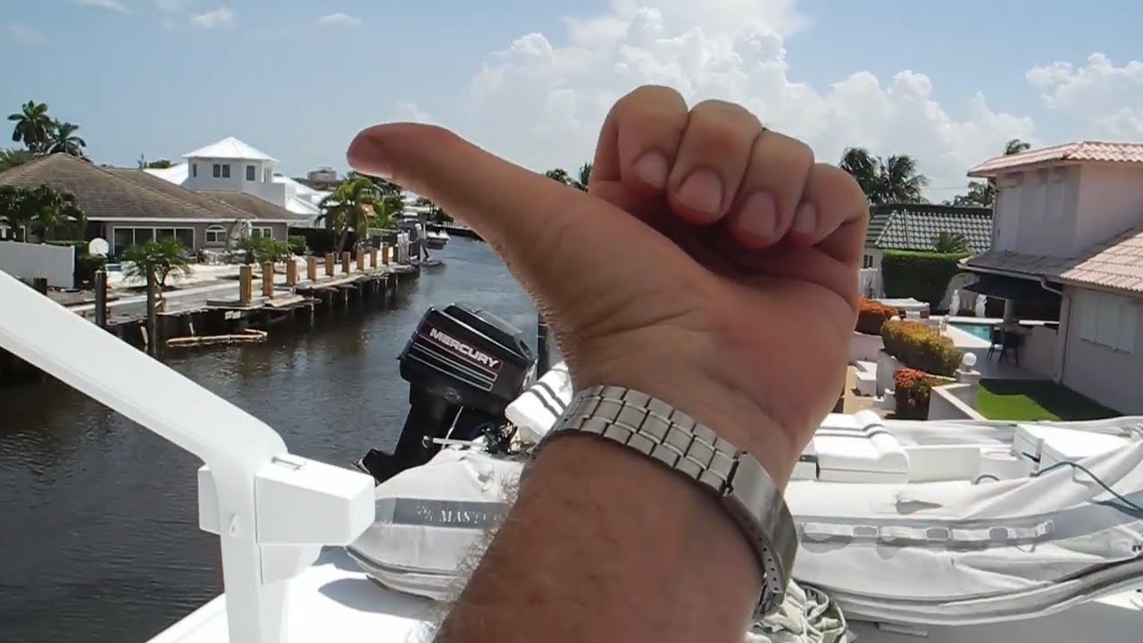Big Hatteras in small private canal Fort Lauderdale
