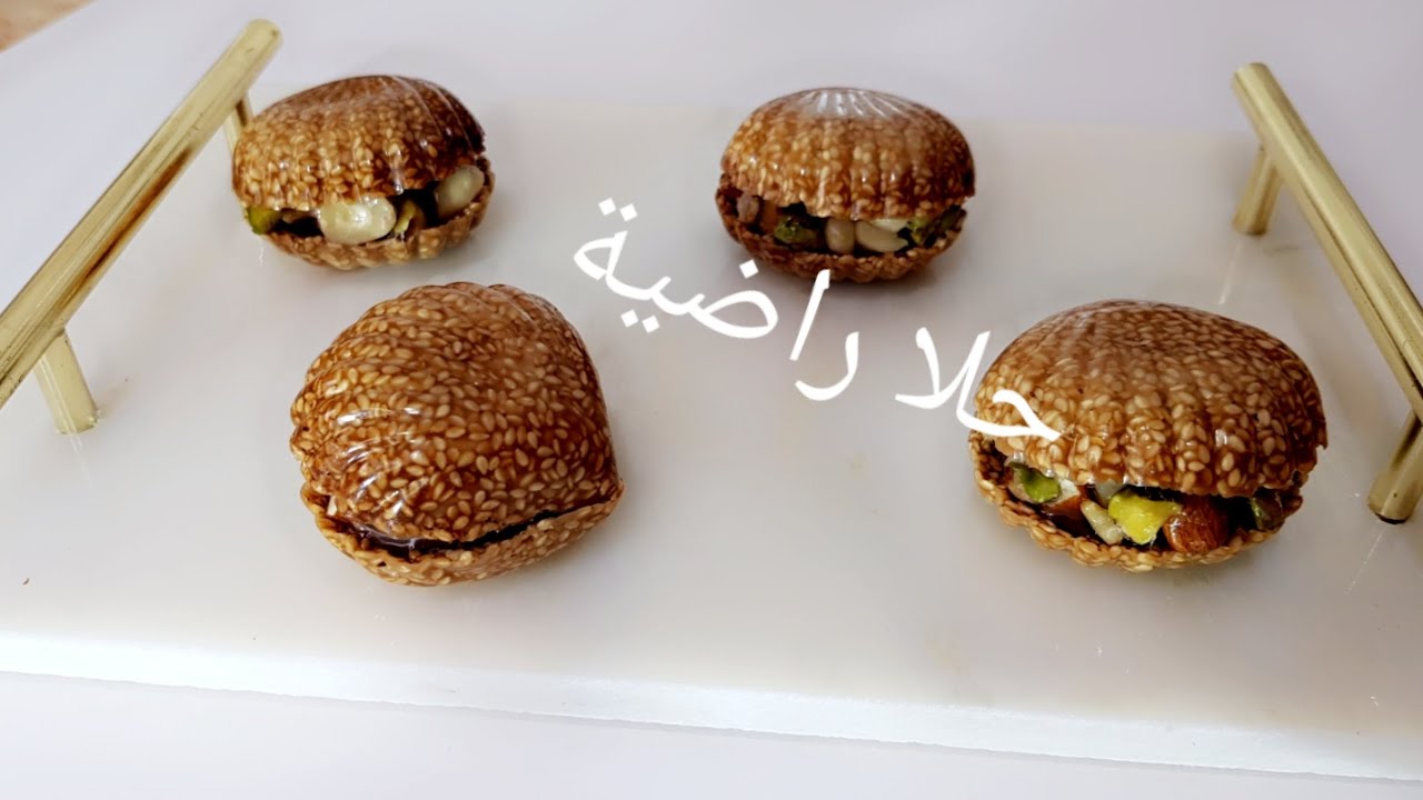 قاطو الكوكياج بالجلجلان ثالث حلويات العيد