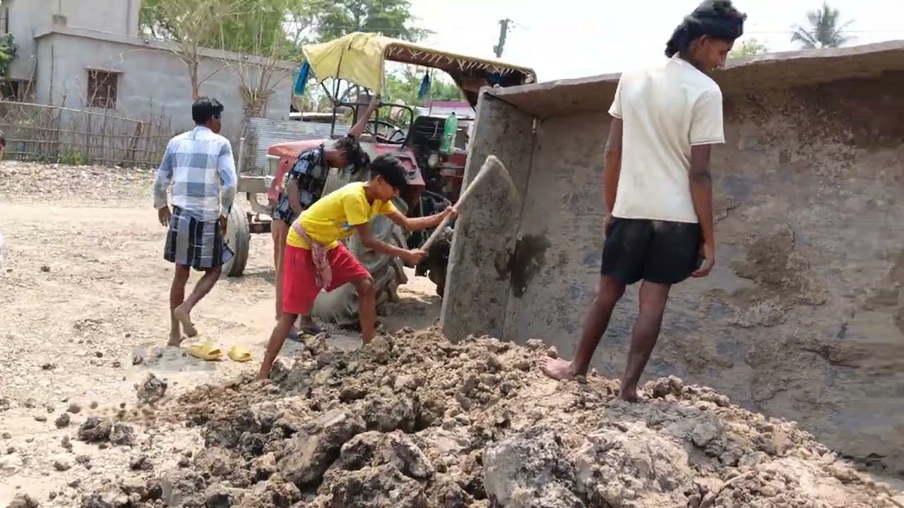 খেলার মাঠের মাটি দেয়ার কাজ চলছে