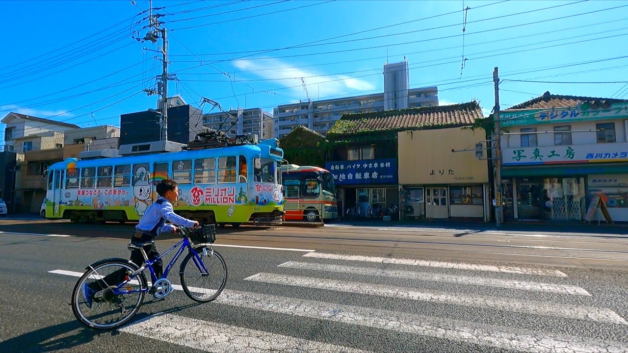 Shikoku Cycling - Asahi Station Shopping Street and around Kochi University, Japan.