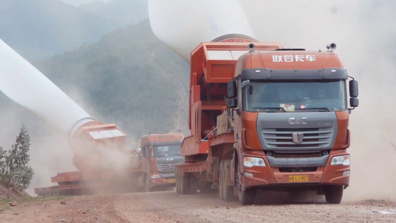 C&C trucks carrying wind turbine blades to the mountaintop