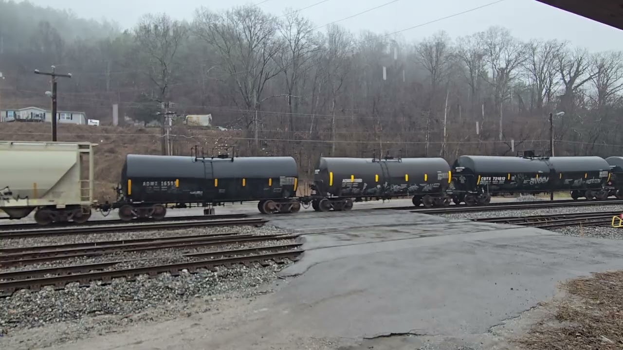 Norfolk Southern 196 heading North at Oakdale, TN with 1 upfront and 2 in the middle.
