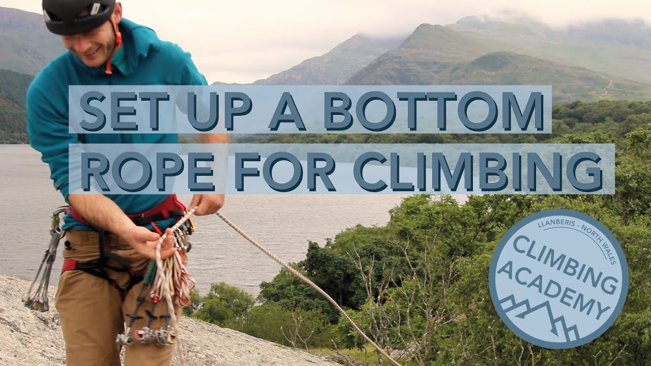 Setting up a bottom rope for climbing.