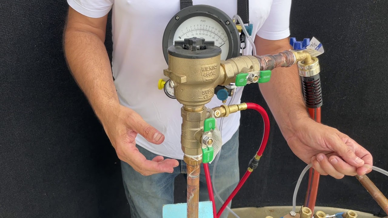 Spill resistant vacuum breaker