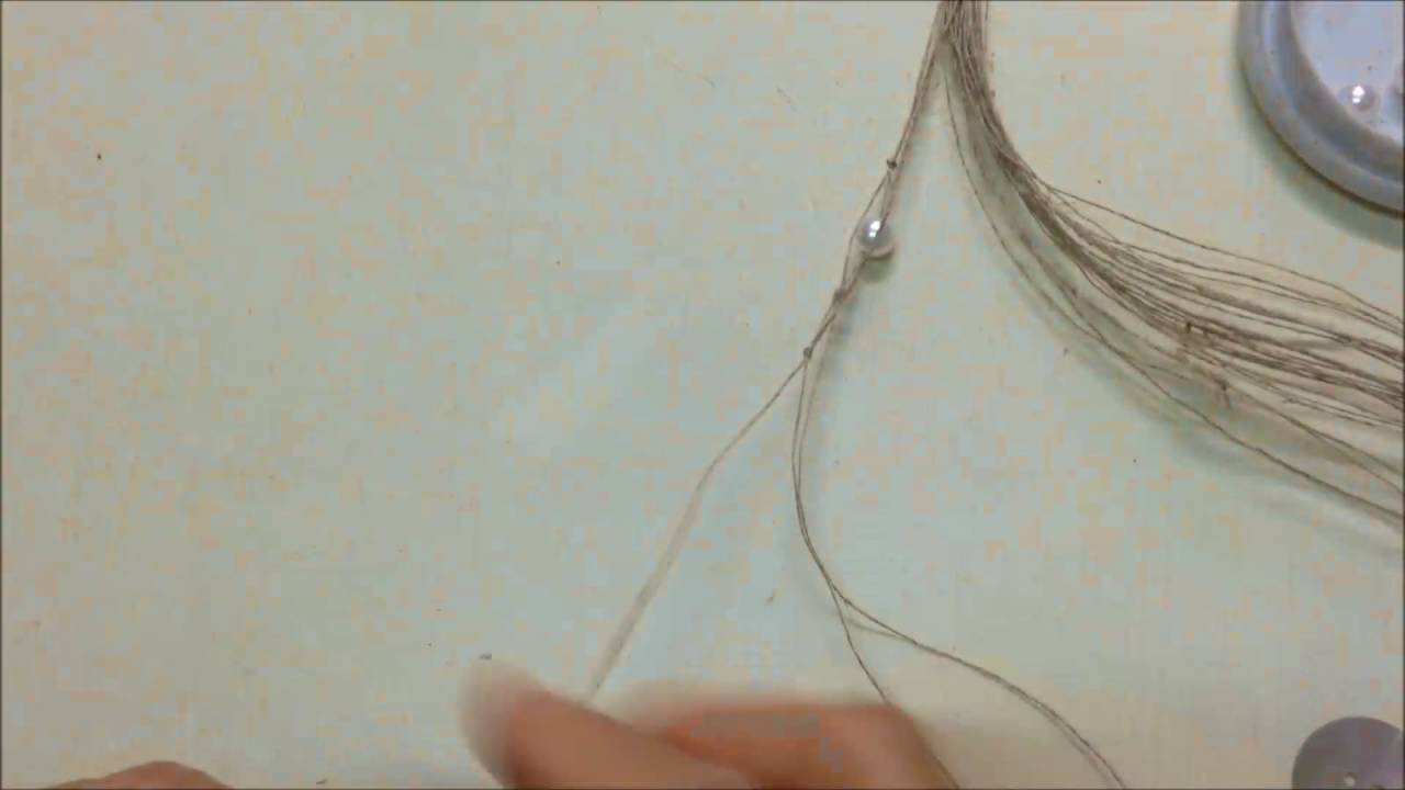 Collana di perle con filo di Lino