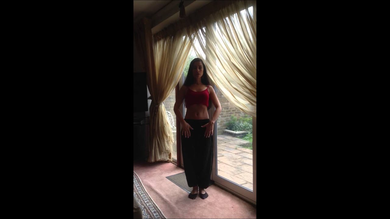 A Short BELLY DANCE COMBINATION for fun!  KNEE DROPS AND CHEST LIFTS AND DROPS