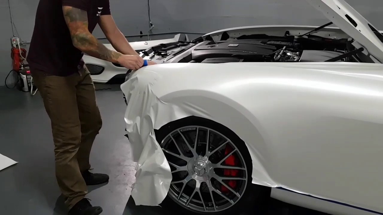 Vinyl wrap Mercedes GTS. Front fender in Avery satin pearl white by @ckwraps www.ckwrapsmiami.com