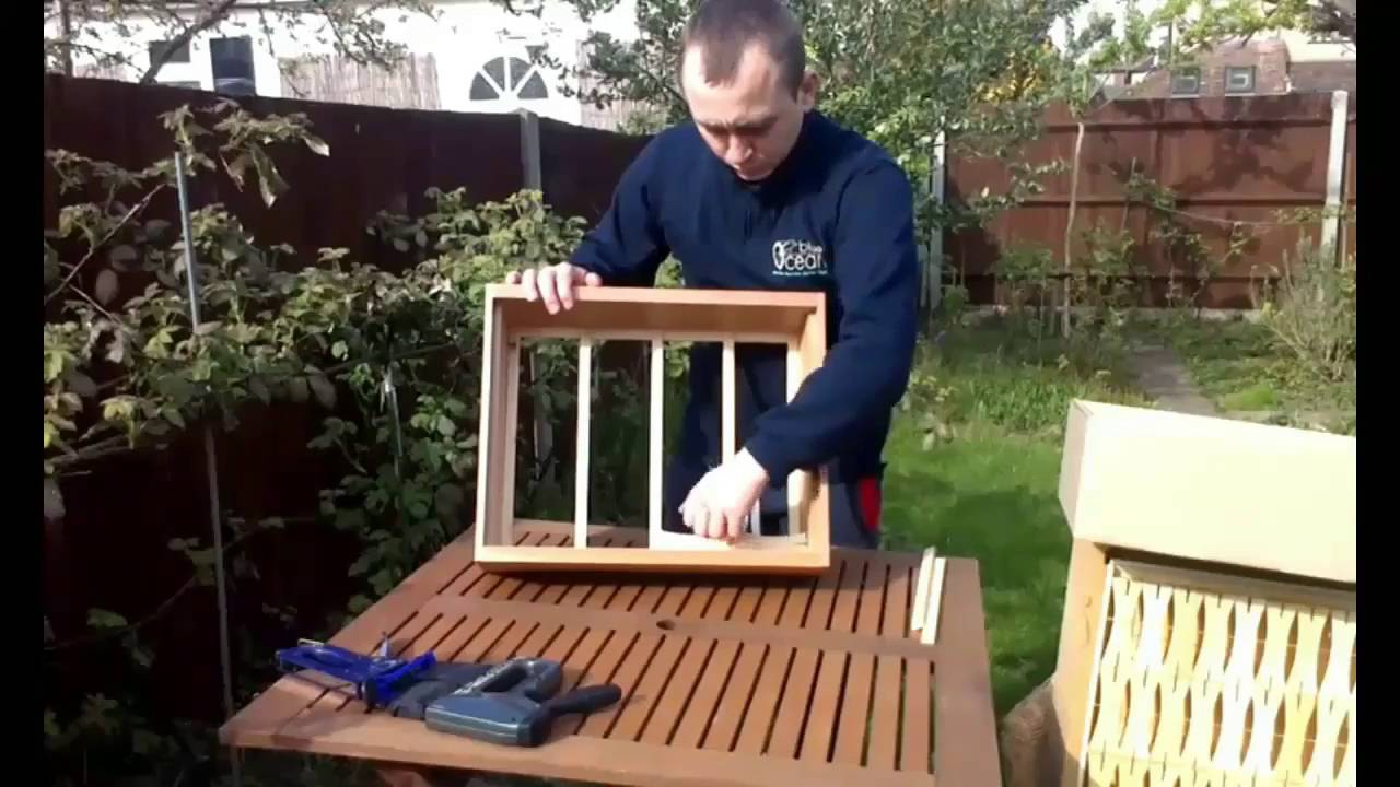 Installing HC 999 sections for comb honey production into the Langstroth super