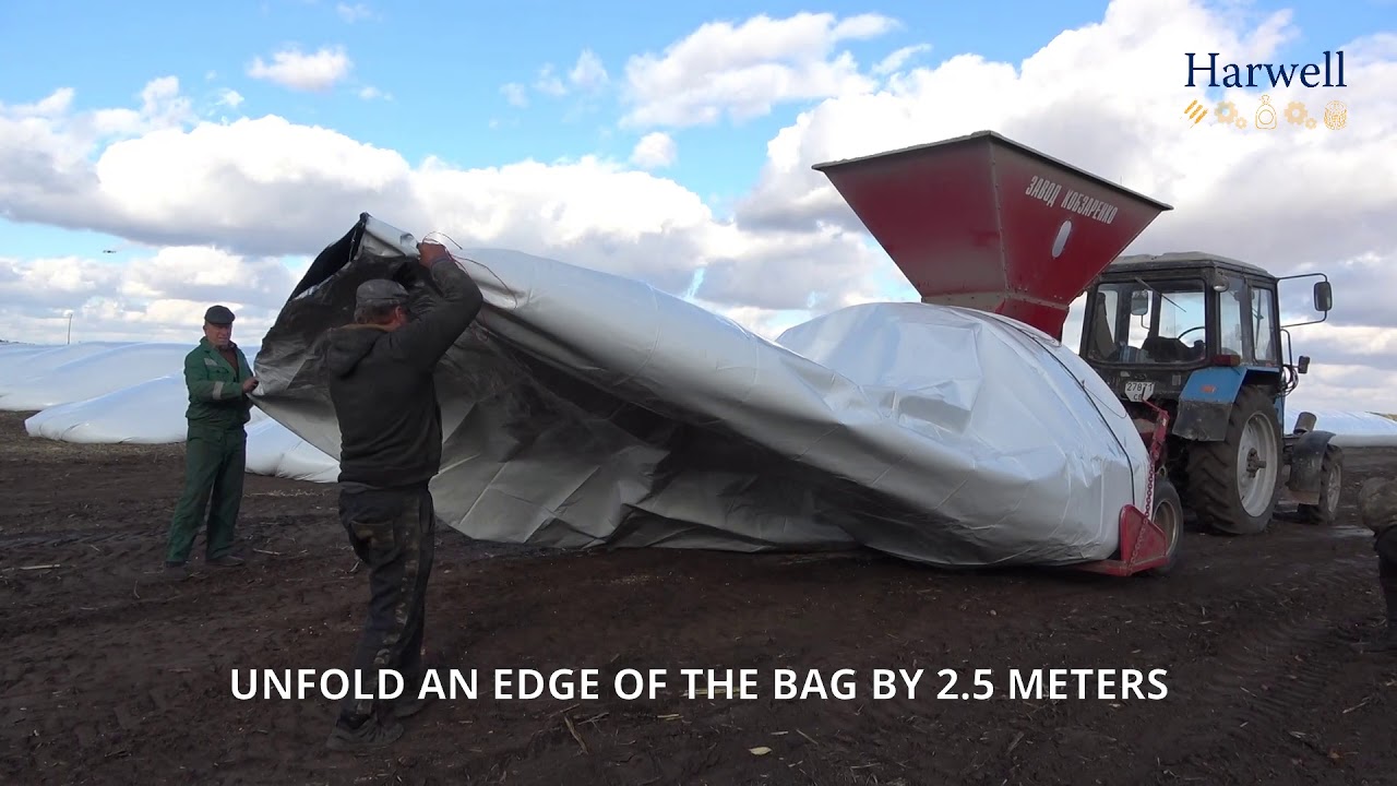 Video instruction of loading the grain and silage bag TM Harwell
