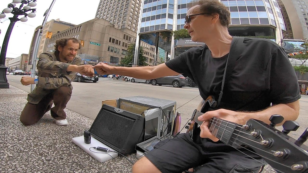 Jamming Pink Floyds' Great gig in the sky -Busker RIPS HOT GUITAR SOLO, gets paid in fist bumps?