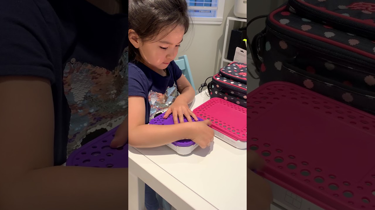 5 year old opening Lunchbots Trio2 and Cinco