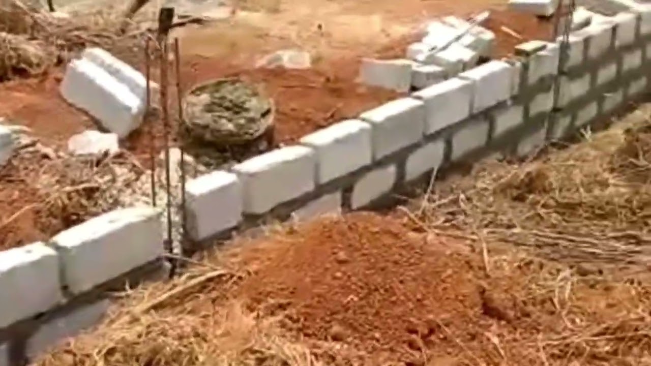 Building in Ghana ~ Fence wall