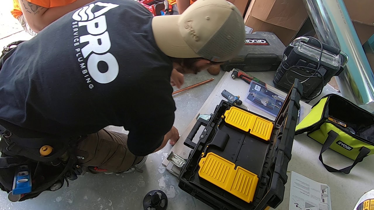 Teaching the apprentices How to Install Moen Posi Temp Shower Valve | Residential Rough in