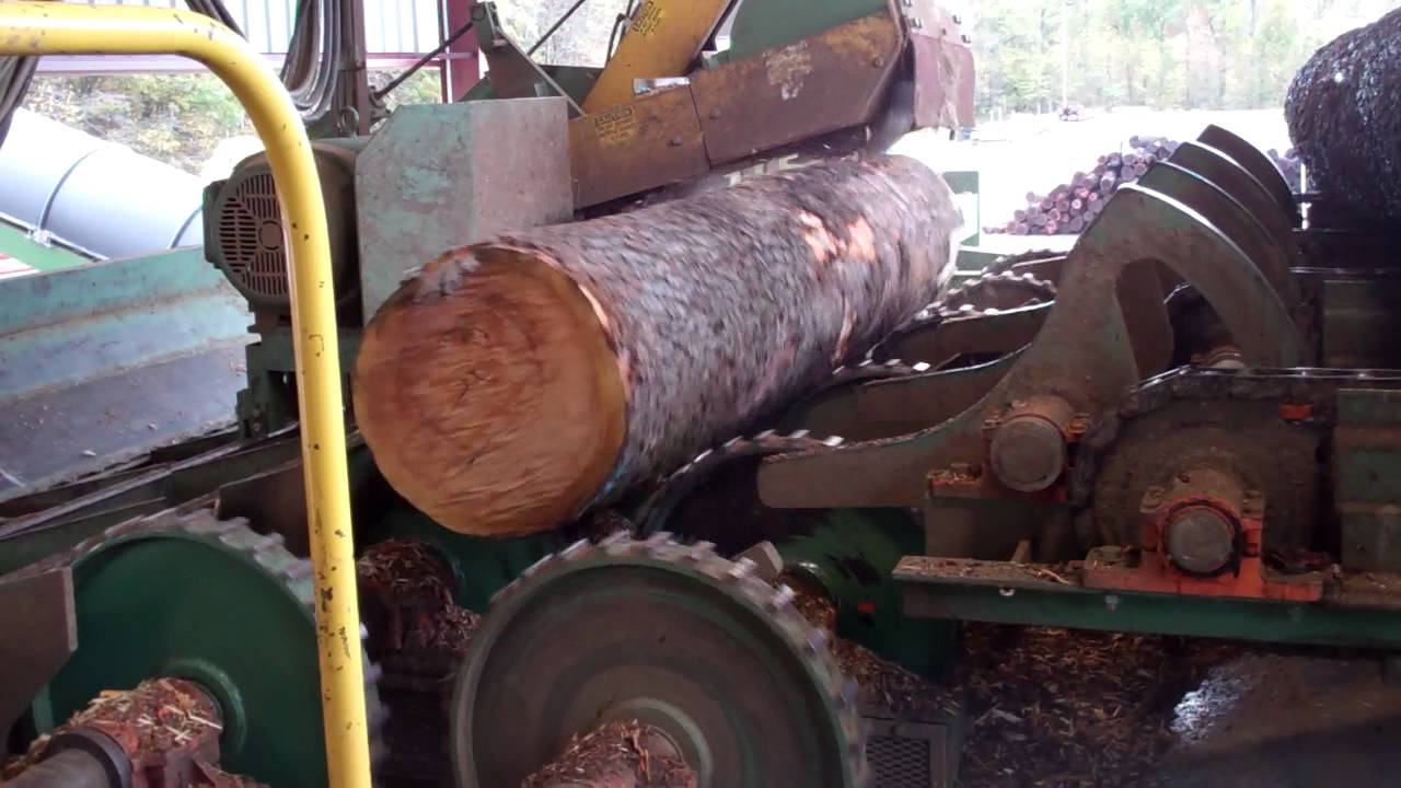 HMC'S DOUBLE-HEADED DEBARKER WITH REDUCTION HEAD