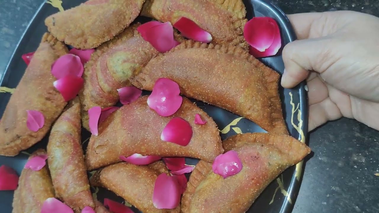 Bina mava bina maida ke rangoli gujiya# amazing #yummy recipe 
