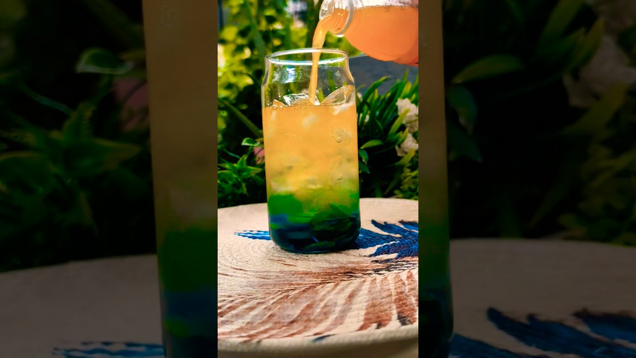 Have You Ever Tried this Zesty Orange Curacao Mojito?? 🍹