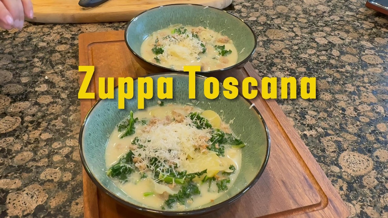 Zuppa Toscana A cozy, creamy soup with sausage, potatoes, and kale, perfect for cold days.