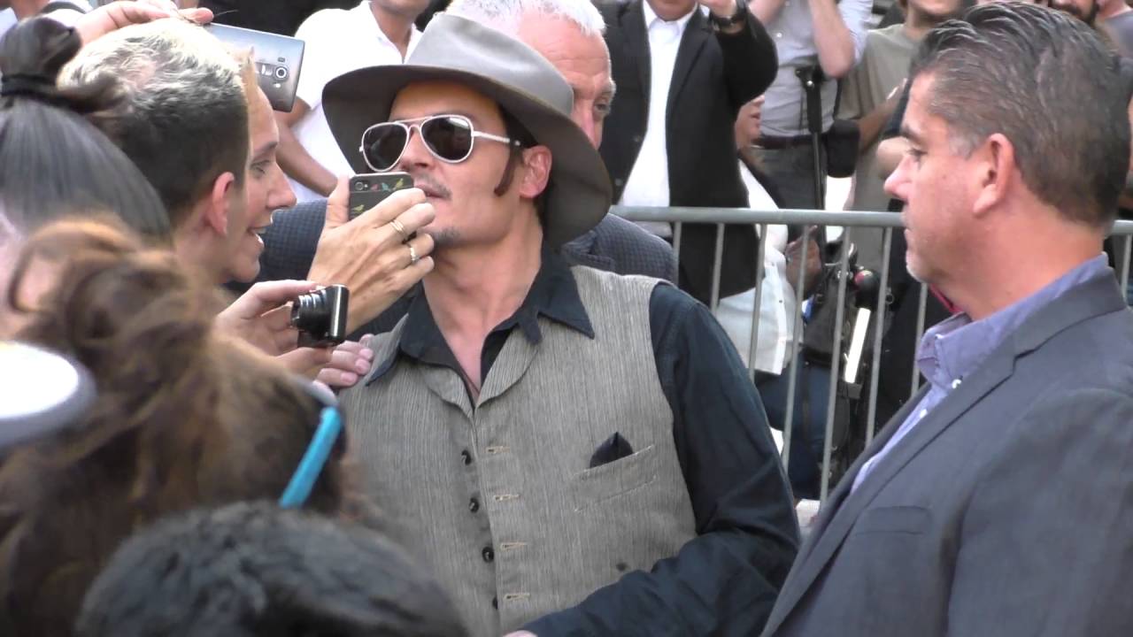 Johnny Depp greets fans at Jimmy Kimmel Live in Hollywood
